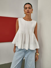 Bluzka bez rękawów z plisowanym peplum