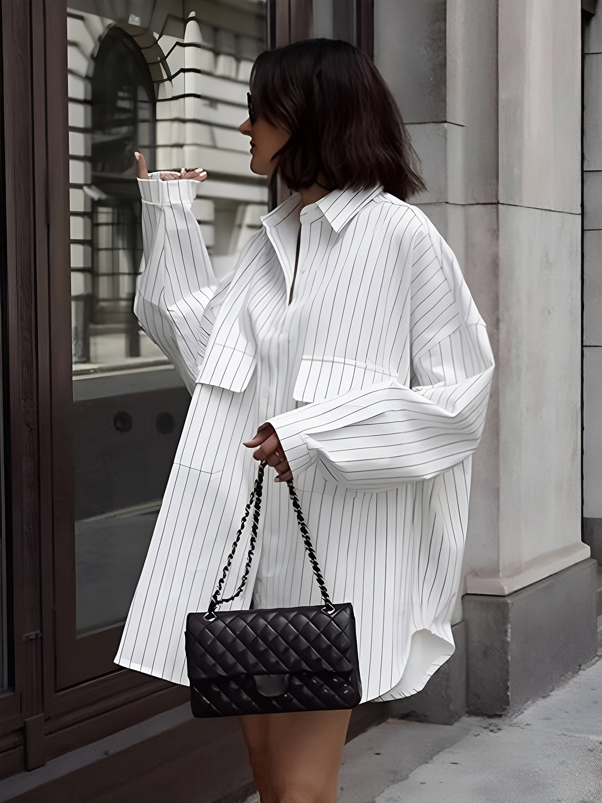 Koszula z dużymi kieszeniami w oversize'owym stylu w paski