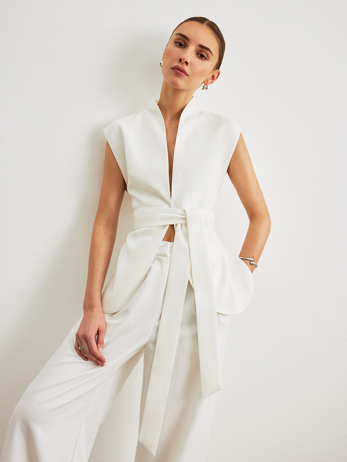 Top z peplum z paskiem