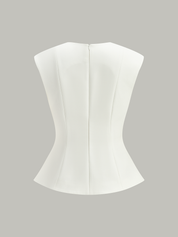 Top Peplum bez rękawów z metalowymi guzikami