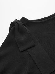 Sweter dzianinowy z krótkim rękawem i kokardą na ramieniu