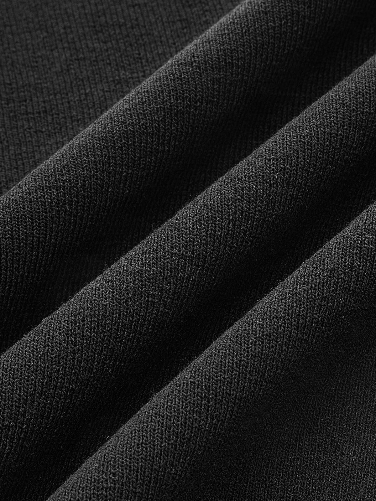 Sweter dzianinowy z krótkim rękawem i kokardą na ramieniu