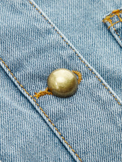Zestaw kamizelki z denimu i plisowanej spódnicy midi