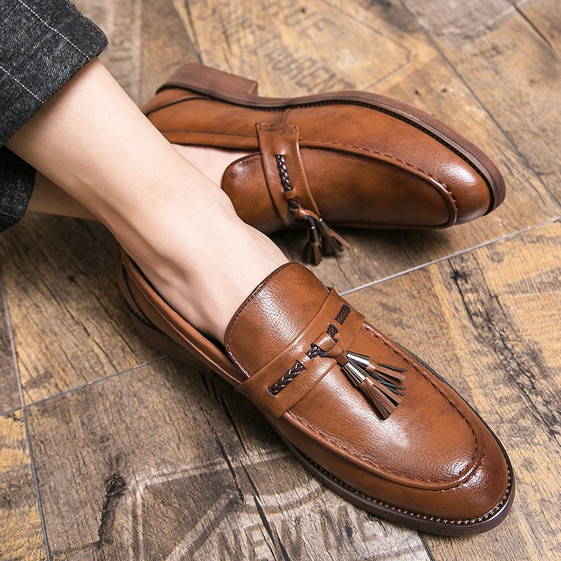 Skórzane loafersy z frędzlami
