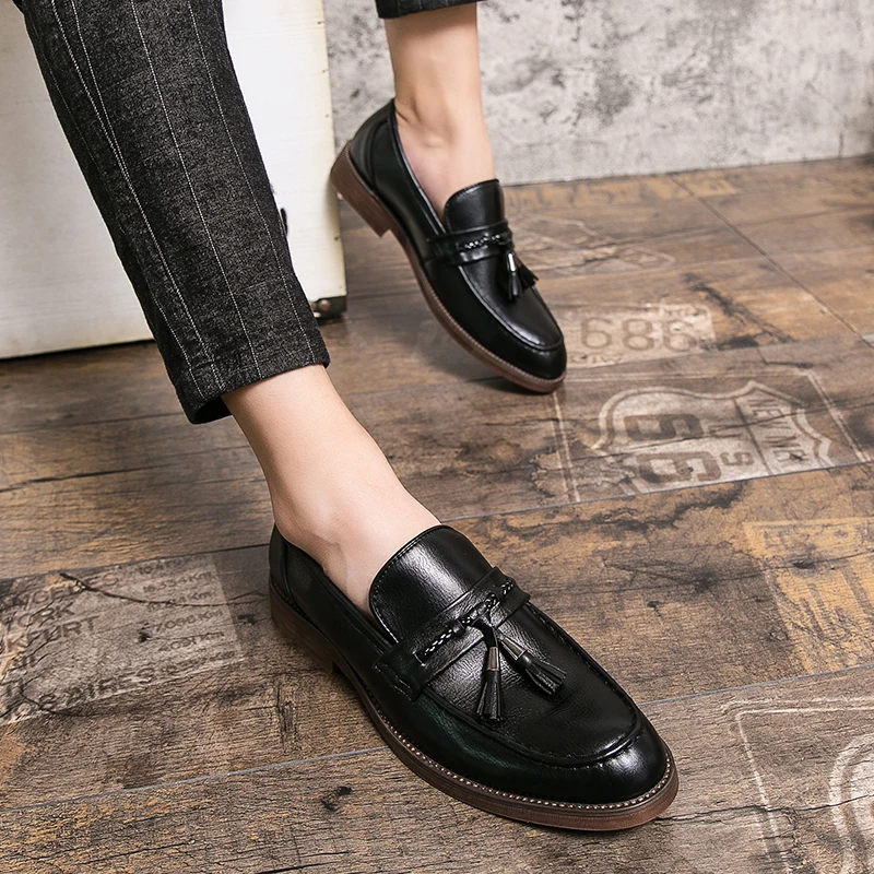 Skórzane loafersy z frędzlami